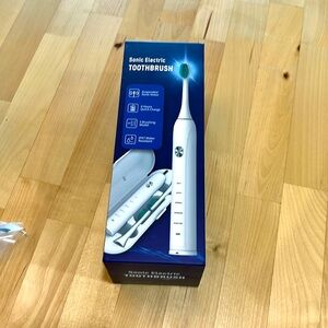 New in box electric toothbrush